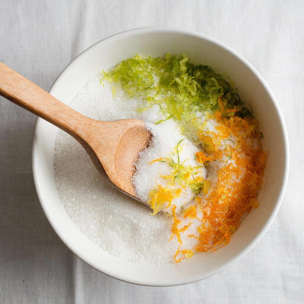 Цитрусовый сахар Цедра лимона и апельсина смешивается с сахаром для ароматизированного сахара