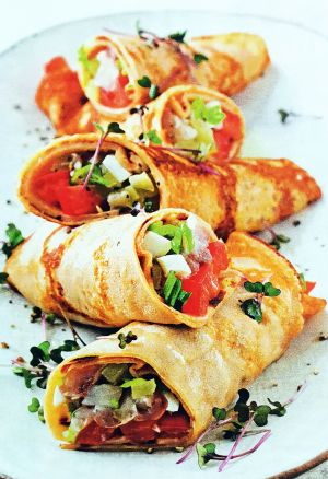 Гречишные блинчики  с сельдью и маринованными огурцами